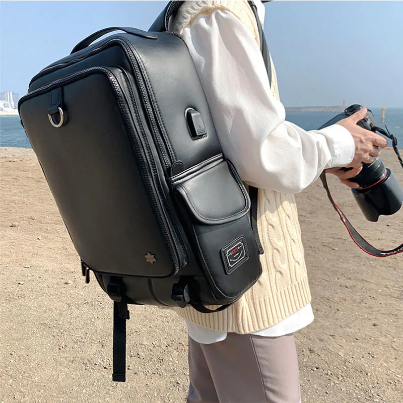 

2023 new PU leather waterproof backpack large capacity with 17 inch computer USB interface backpack large capacity travel bag