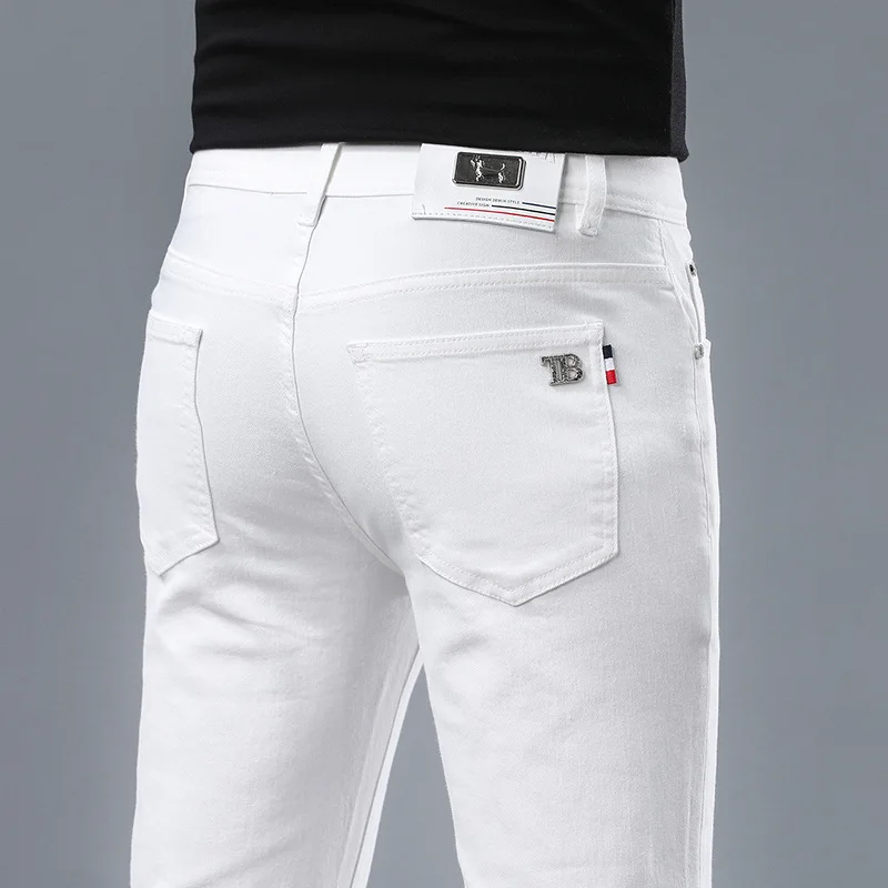 

Autumn pure white jeans men's high-end and fashionable trendy casual all-matching street stretch slim-fit light luxury trousers