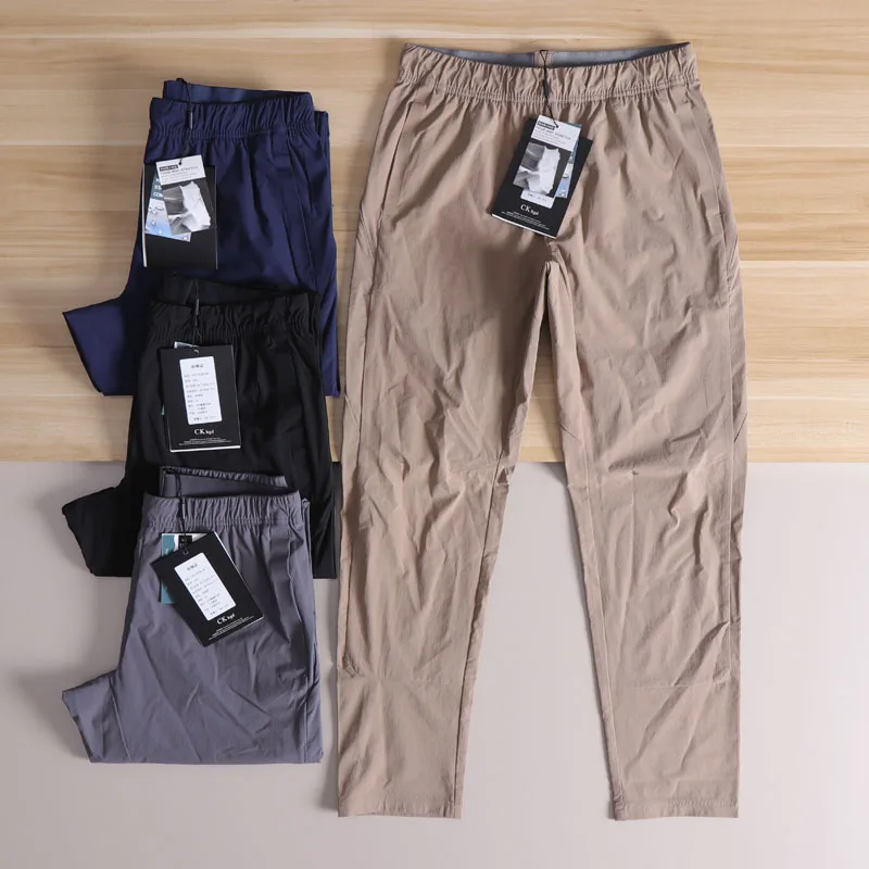 

Деконструированные мужские летние уличные текстурированные дышащие брюки с 3D пошивкой, тонкие повседневные спортивные рабочие брюки, прямые длинные брюки...