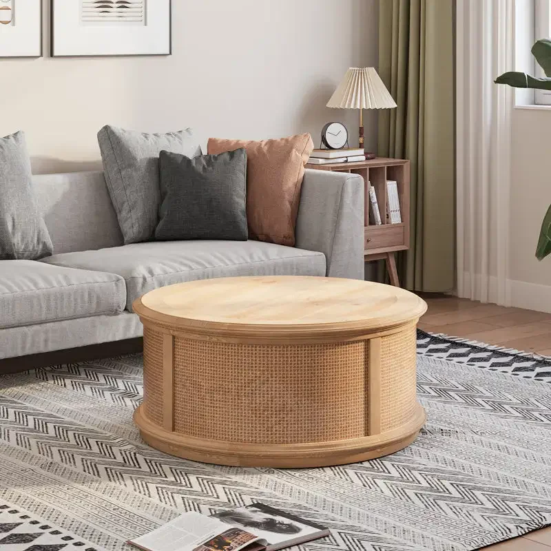 Modern rattan lift table with hidden storage drum design for modern coastal interiors
