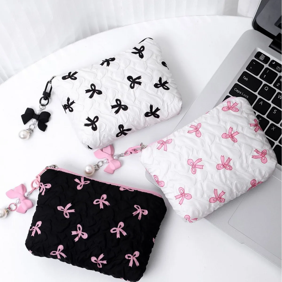 

Bow cosmetic large capacity cute clutch portable toilet change cosmetic storage bag