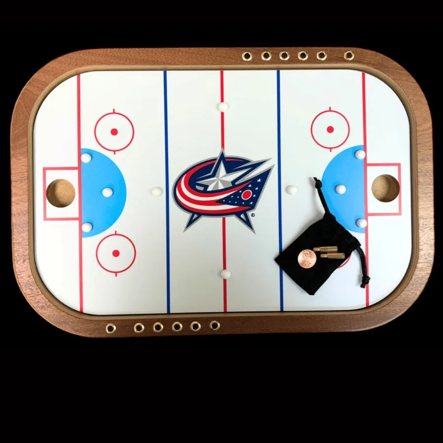 Juego de hockey de Penny Columbus Blue Jackets