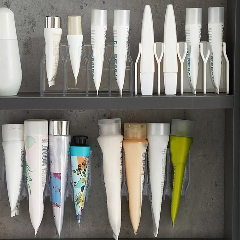 

5Pcs Wall Mounted Facial Cleanser Storage Rack Waterproof Plastic Hand Cream Shelf No-Punch Space Saving Toothpaste Drain Holder