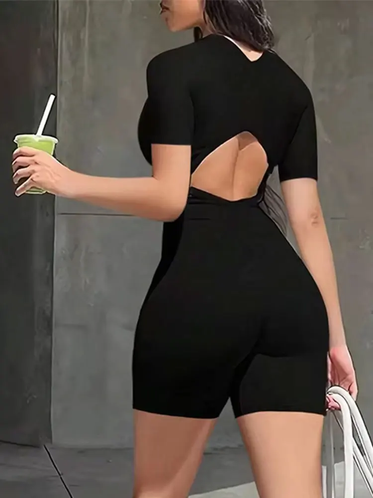 Monos de primavera para mujer, ropa nueva, moda, monos con cremalleras de manga corta, monos negros sexis con cuello en V y espalda descubierta