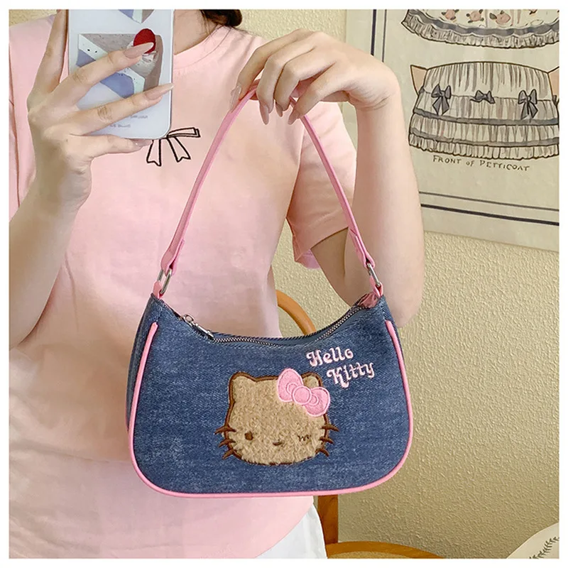 Bolso de gran capacidad con dibujos animados de Anime Hello Kitty, bolso portátil Kawaii para monedas y teléfono móvil, bolso con forma de corazón para chica, regalo de vacaciones