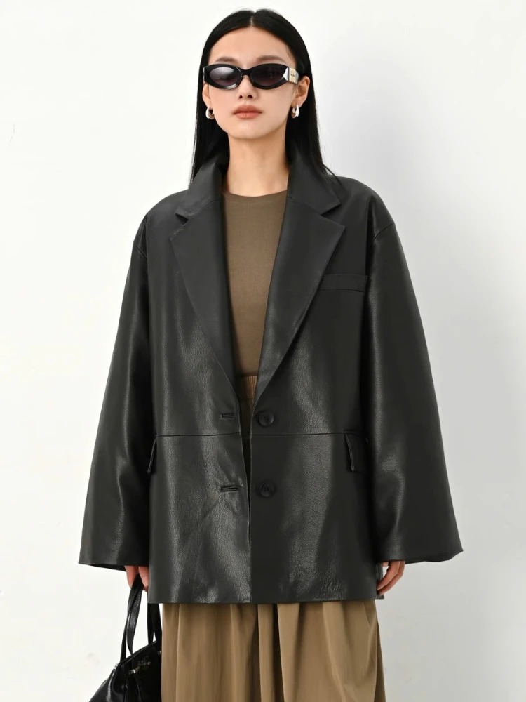 Echt lederen ganzendonsjack voor dames herfst winter 2022, nieuwe high-end eenvoudige zachte zwarte echte schapenvacht donsjas met riem