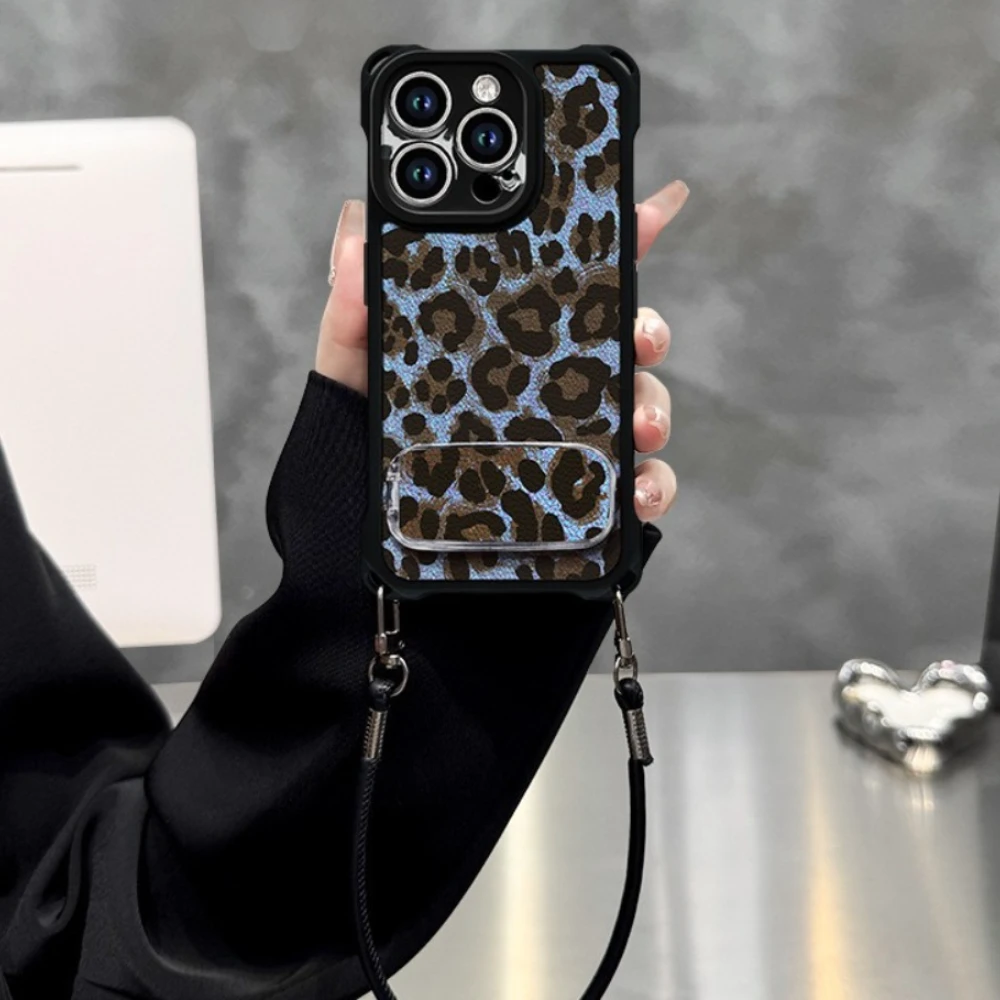 

Роскошный чехол с леопардовым принтом для iPhone 17 16 Pro Max 15 Plus 14 13 INS, защитный чехол с модным узором и зеркальным держателем, ремешком