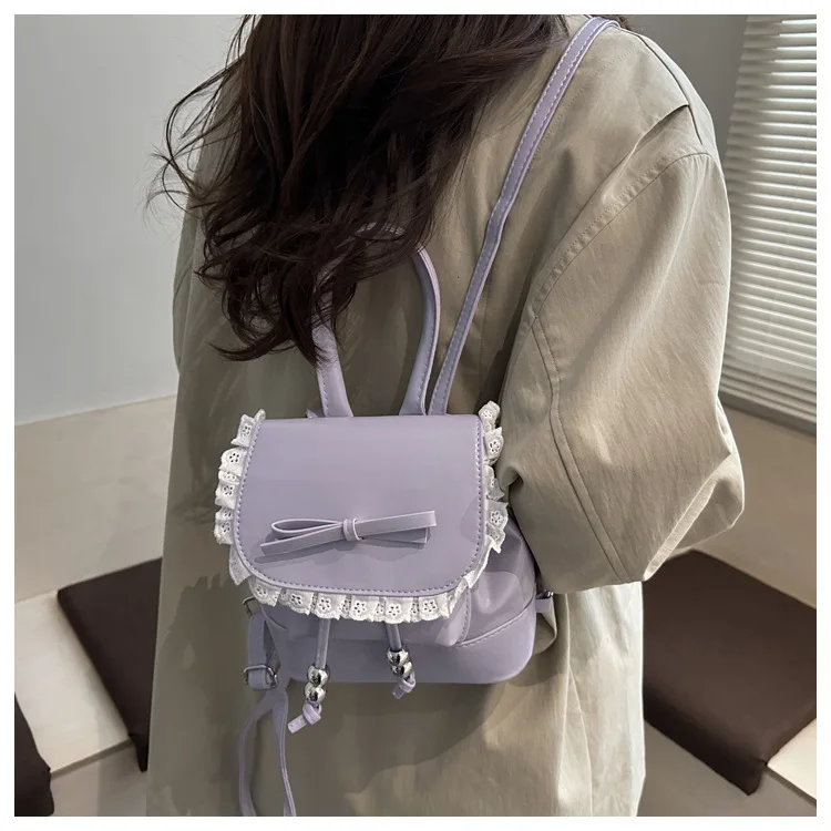 Lässiger Schulterrucksack aus PU-Leder mit Spitzenbesatz, eine zarte und süße Mini-Pendlertasche für Frauen