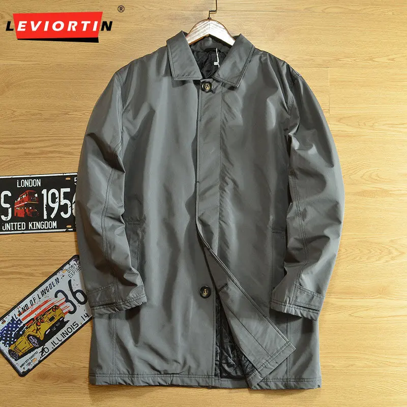 Winter men's British style windproof, waterproof clip on cotton warm and versatile solid color medium to long windbreaker jacket