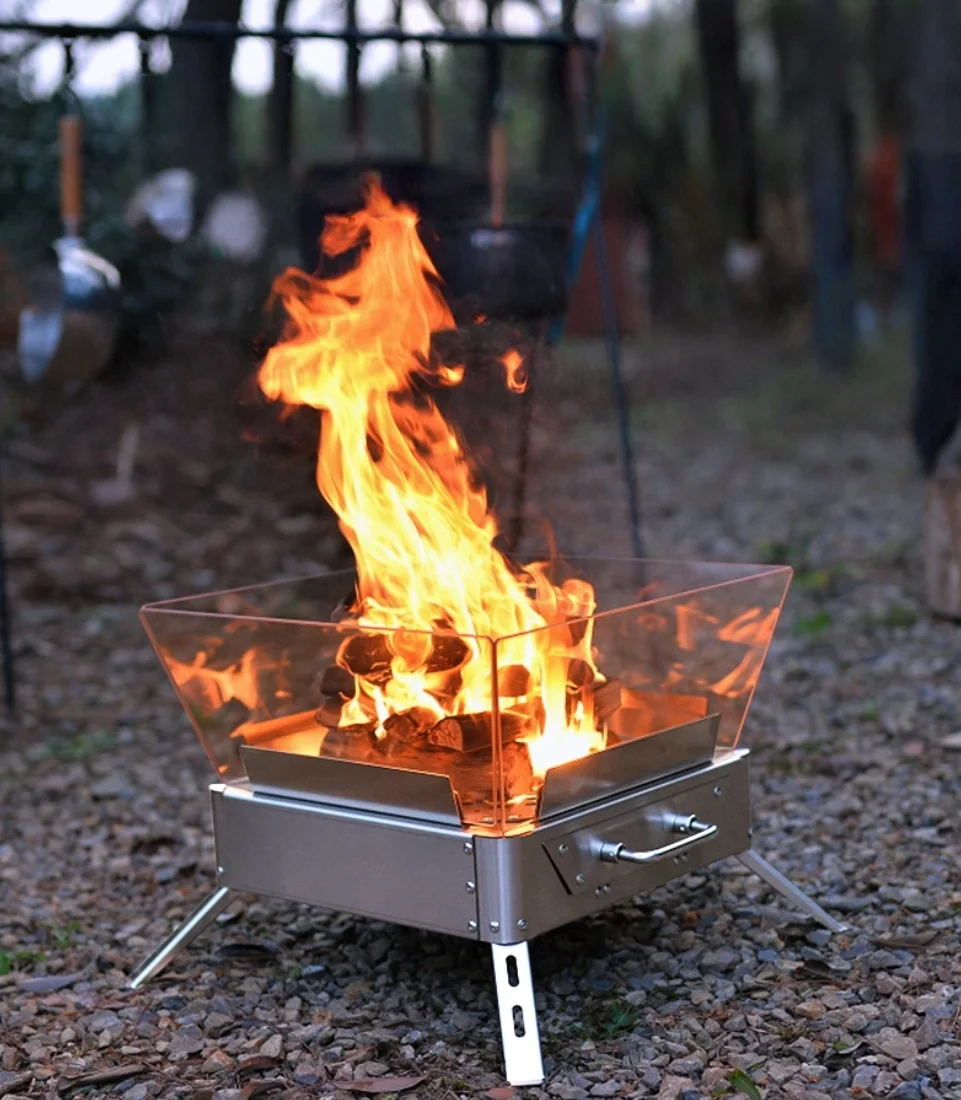 

Outdoor Camping Firewood Cooker Station Stainless Steel Foldable Charcoal BBQ Grill and Tea Stove for Campfire Cooking