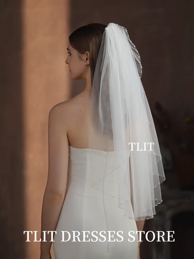 TLIT Элегантный однослойный свадебный головной убор с фатой длиной до локтя и жемчугом с обрезанным краем по краю по индивидуальному заказу для женщин
