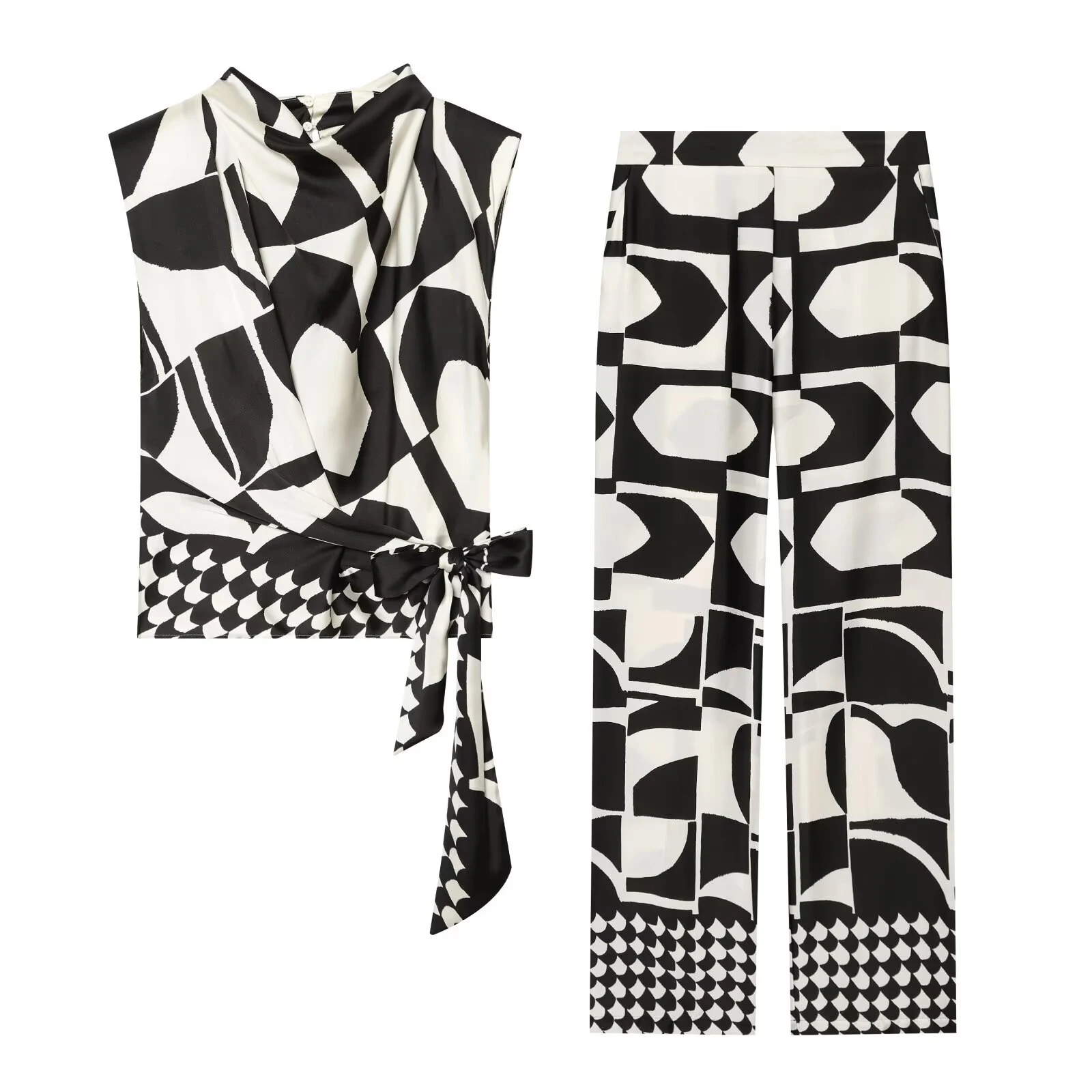Herbstliches Damen-Set mit ärmellosem Oberteil mit Knotenbund und geometrischem Print, Schulterpolstern und hochtaillierter Hose mit geradem Bein.