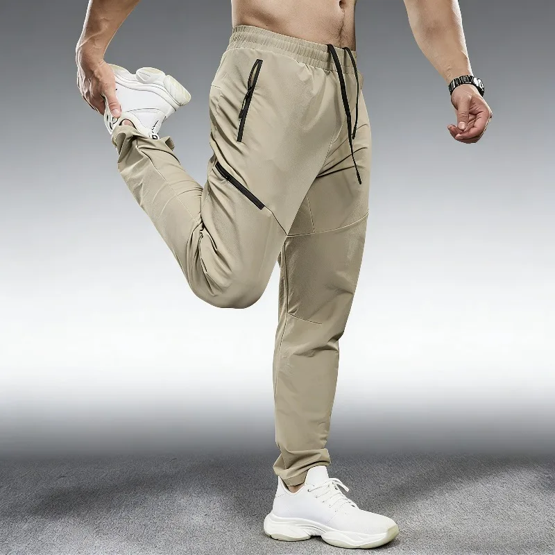 

Breathable Loose Running Pants for Spring and Autumn Sports Training Elastic Waterproof Zipper Pocket Sports Pants