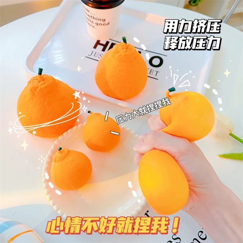 Realistischer Orangen-Stressball - Langsam Aufsteigendes Quetschspielzeug zur Angstlinderung, Niedliches Zitrus-Fidget-Sensorikspielzeug für Erwachsene