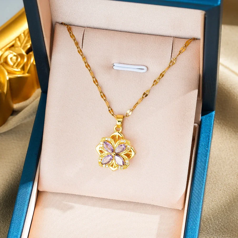 2025 new A set of women's necklace rings featuring a rotating four-leaf flower set with zircon titanium steel