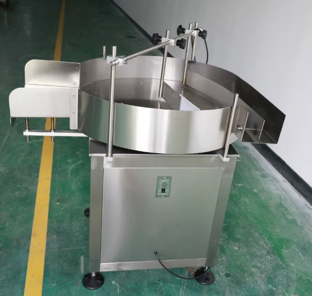 Tocadiscos giratorio automático de colección de alimentadores de botellas