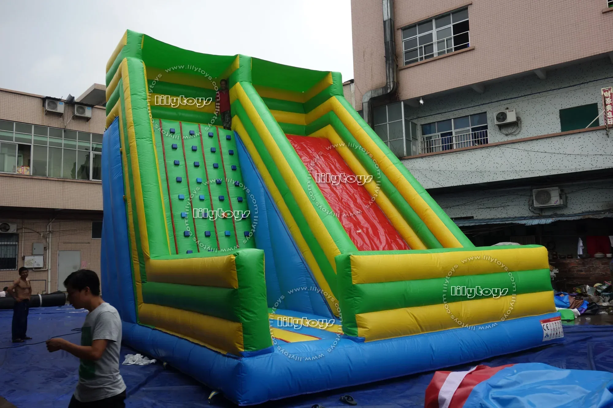 Giant Adult Inflatable Moving Rock Climbing Wall With Mattress And Safety Belt Climbing Wall Slide For Sale