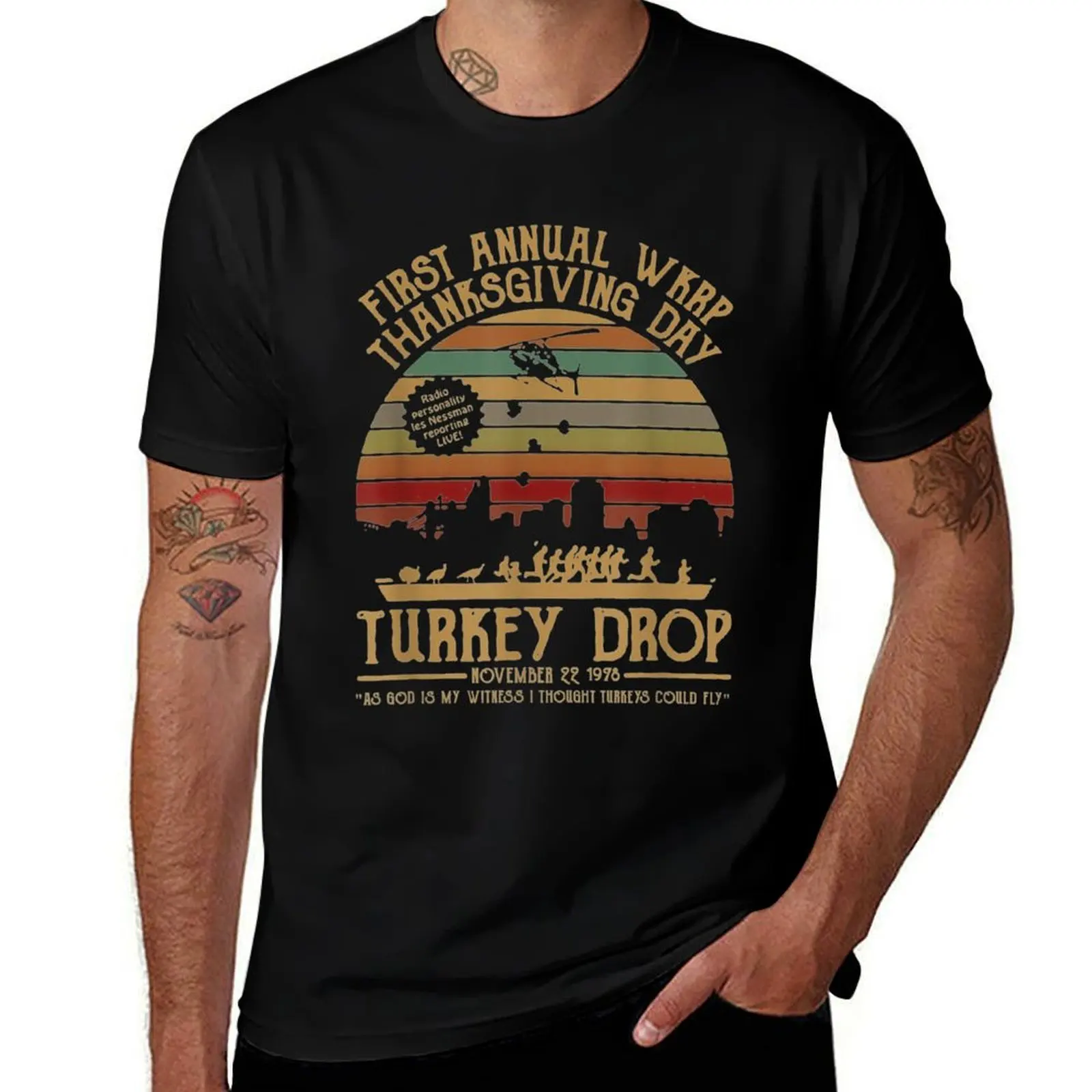 

First annual WKRP Thanksgiving Day Turkey Drop with Les-Nessman Classic . T-Shirt man t shirt cotton high quality T-Shirt
