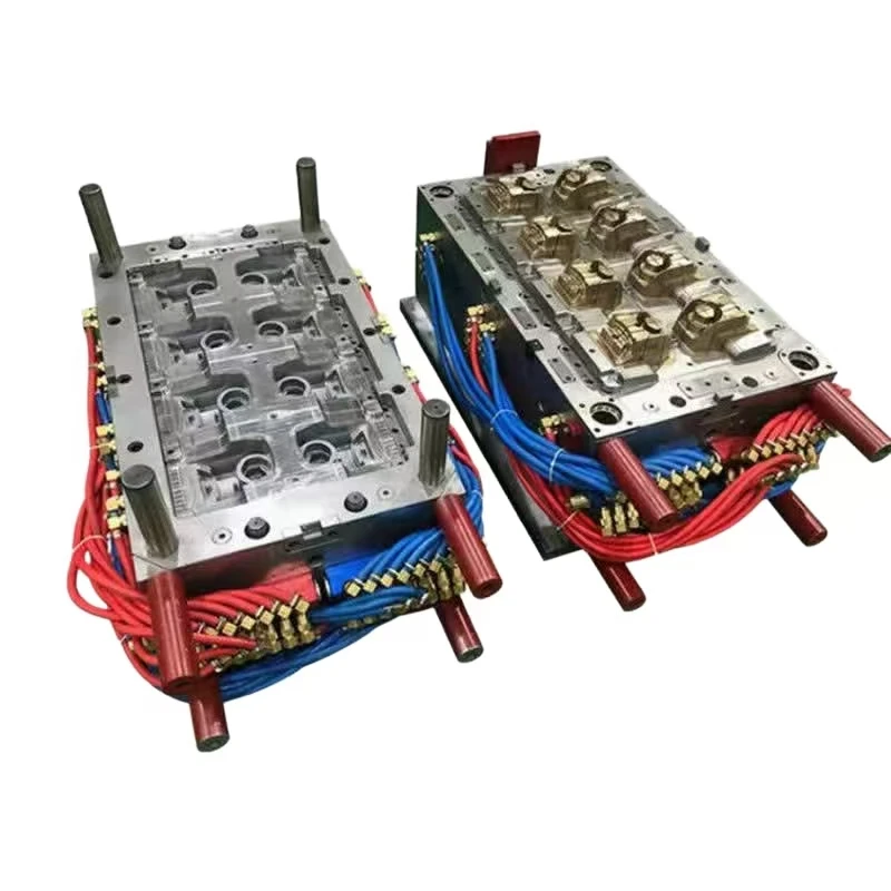 

Injection Molding Machine Plastic Injection Molds and Molding Services Multi-cavity injection mold with cooling channels.