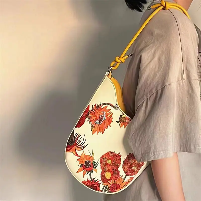 2025 new fashion women's leather leather retro sunflower seed rope knot and color paint series handheld armpit crossbody bag