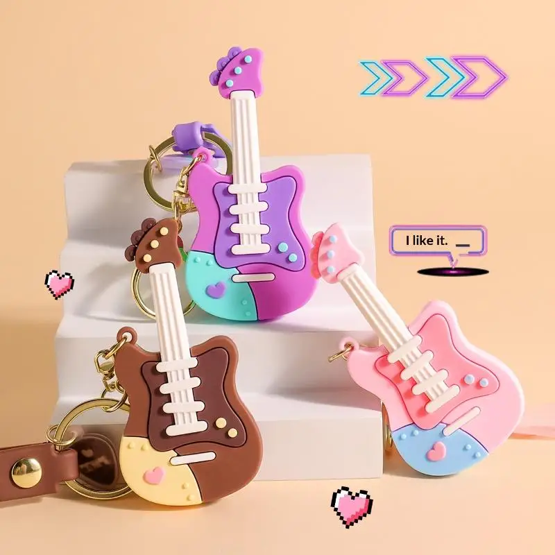 Niedlicher Cartoon-Gitarren-Schlüsselanhänger aus Silikon mit Handschlaufe, Pastell-Design für Taschendekoration, Geschenk für Musikliebhaber – Detail 3