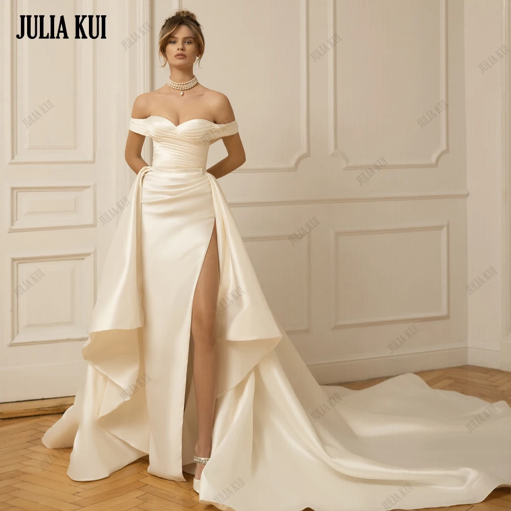 

Julia Kui Custom Perfect Ruffled Silk Sheath Gown With A Ball Overskirt Ruched Pleats Off Shoulder Sleeves 2 In 1 Bridal Gowns
