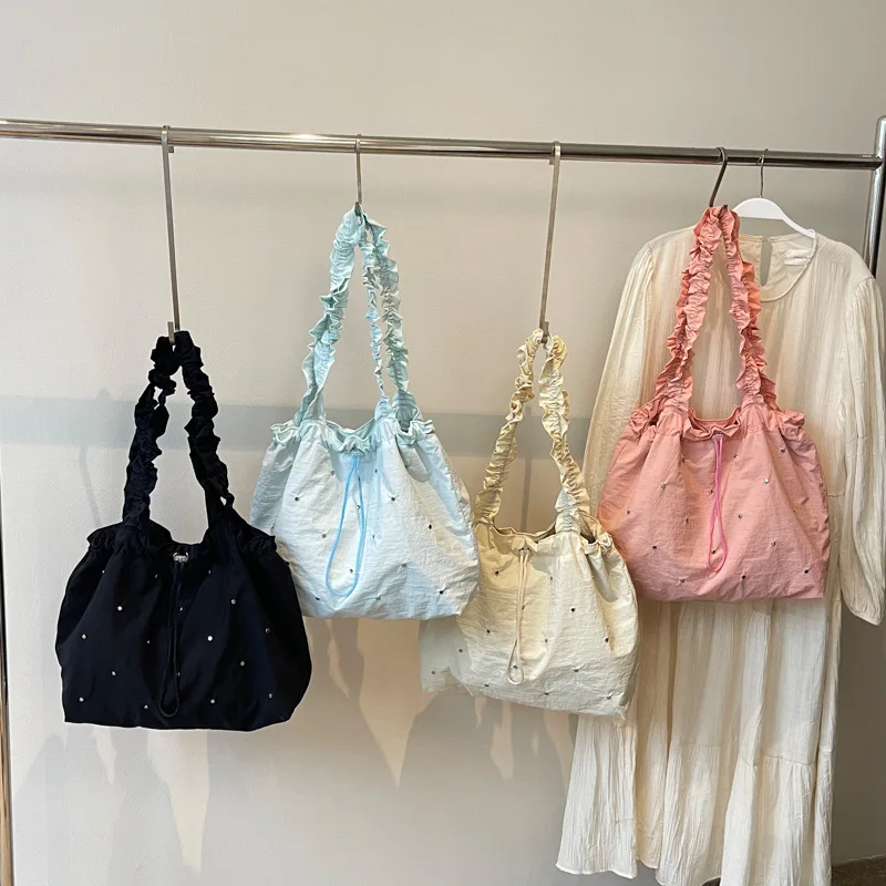 Lightweight pleated women's shoulder bag rivet personality Tote bag clasp pull rope strap mouth handhold armpit bag