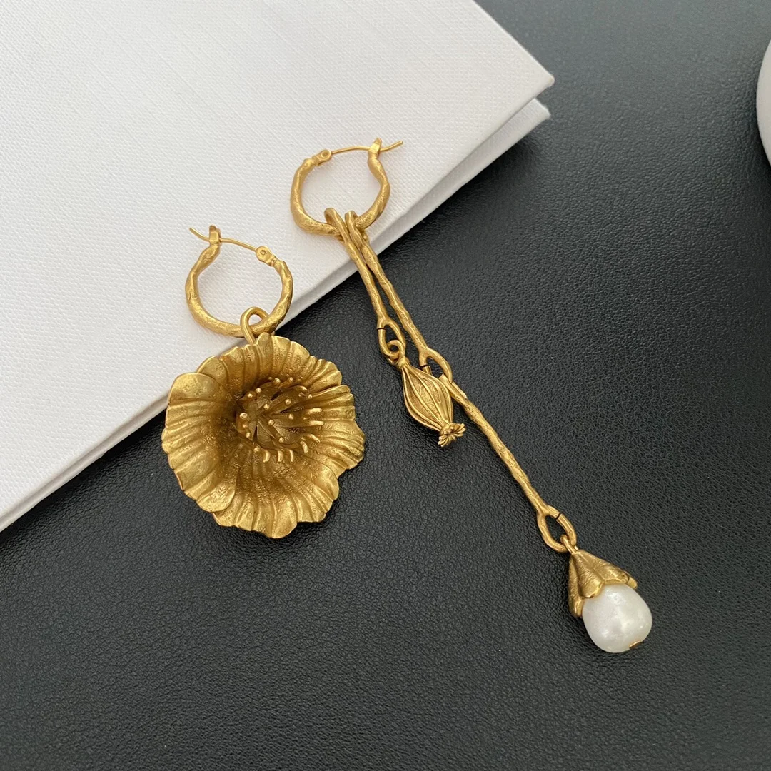 

French asymmetrical golden petal heavy industry European and American pendant earrings for daily wear