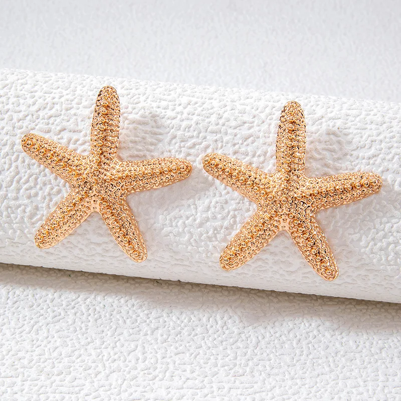 Tocona Fashion Versatile Alloy Metal Personalized Starfish Earrings Beach Vacation Style Small Crowd Earrings Female 25273