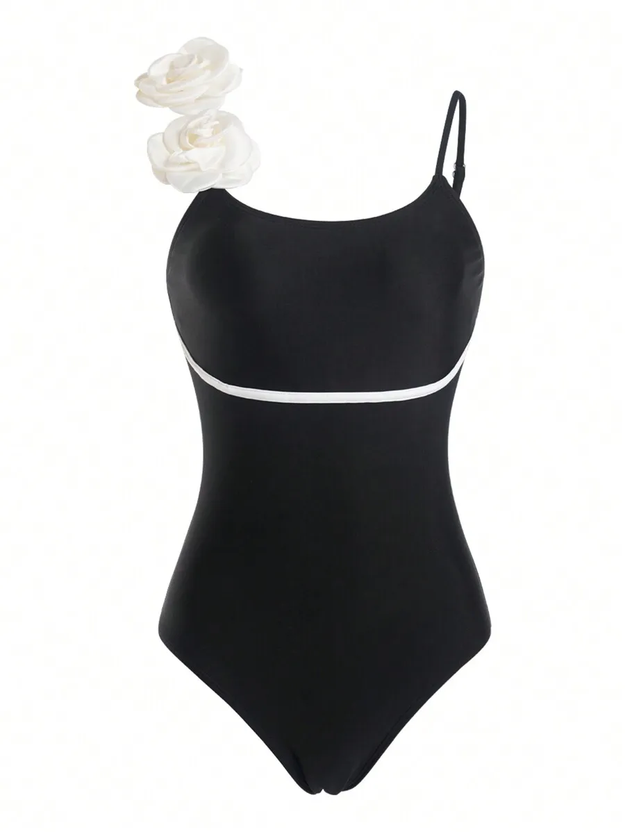 

Womens Black Solid One-Piece Swimsuit With White Trim And Floral Accent