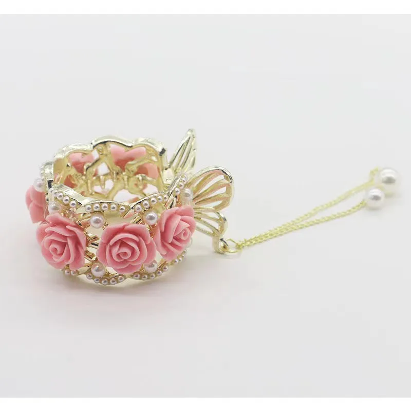 

Новая заколка для волос в виде розы — это небольшой головной убор с хвостиком для девочек, сладкий и универсальный аксессуар для волос и аксессуар для волос в стиле ретро.