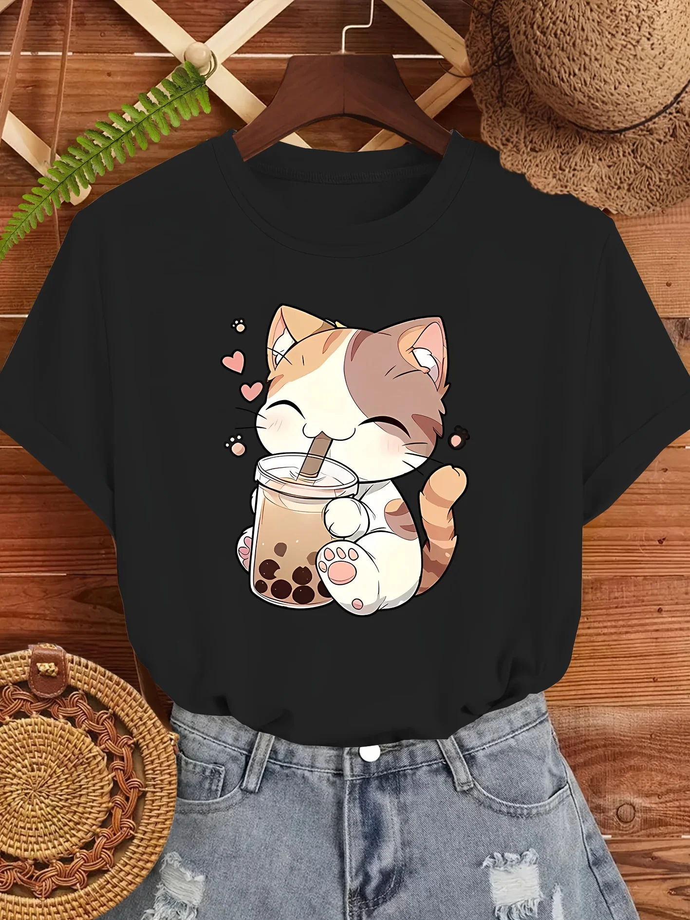 A Cute Patterned Orange Tabby Cat with a Smile Is Happily Holding a Milk Tea Drink Featuring a Small Heart Print Design