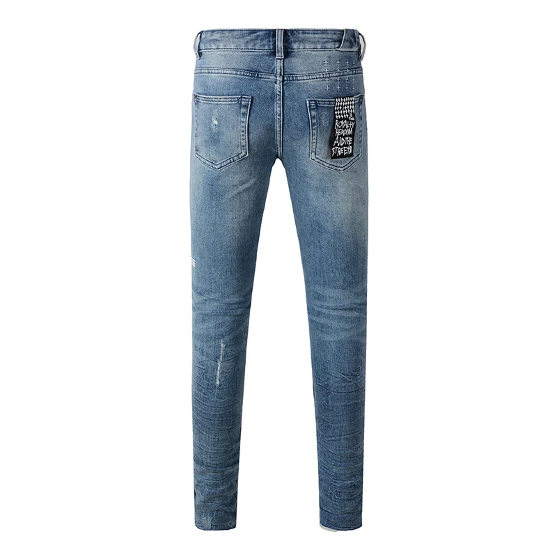 Gewaschene blaue Skinny-Jeans für Herren in Originalqualität mit Knopfleiste und zerrissenem Loch