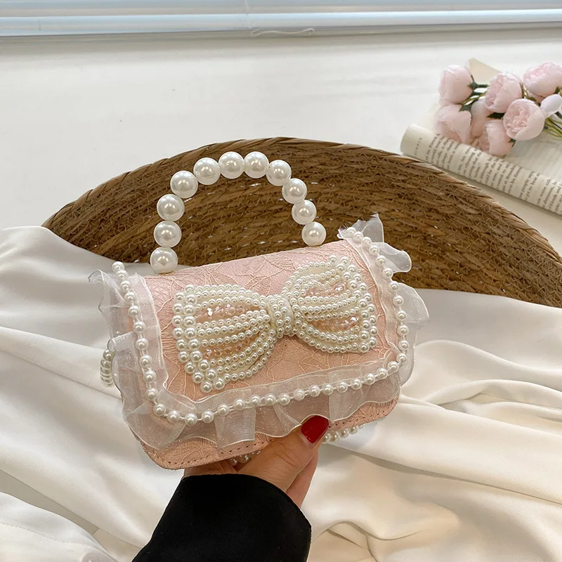 

Новая кружевная маленькая квадратная сумка с жемчужным бантом, дорожная сумка-Кроссбоди с губной помадой, детская маленькая сумка, женские сумки люкс 2024, Прямая поставка