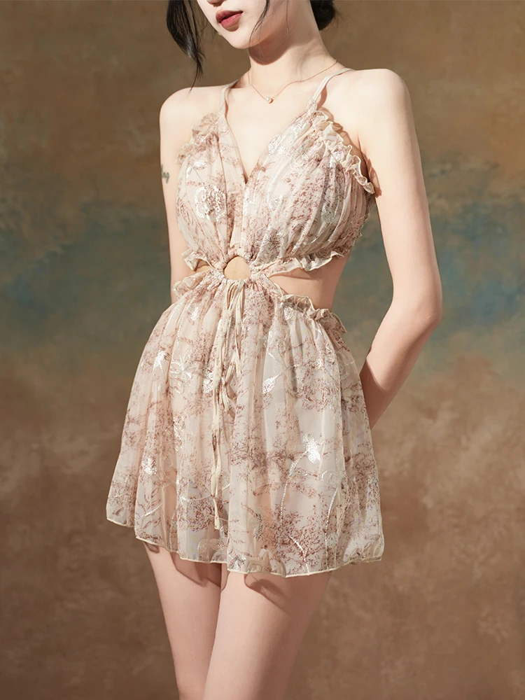 Traje de baño para mujer verano 2025 nueva Hada de una pieza traje de baño de encaje conservador estampado volantes hueco Sexy sin espalda trajes de baño de vacaciones