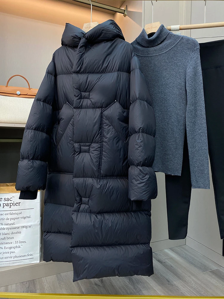 المرأة 2025 جديد كبير الحجم مقنعين الشتاء سترة منفوخة الصلبة سميكة الدافئة الزنانير ربط بطة بيضاء أسفل معطف الركبة