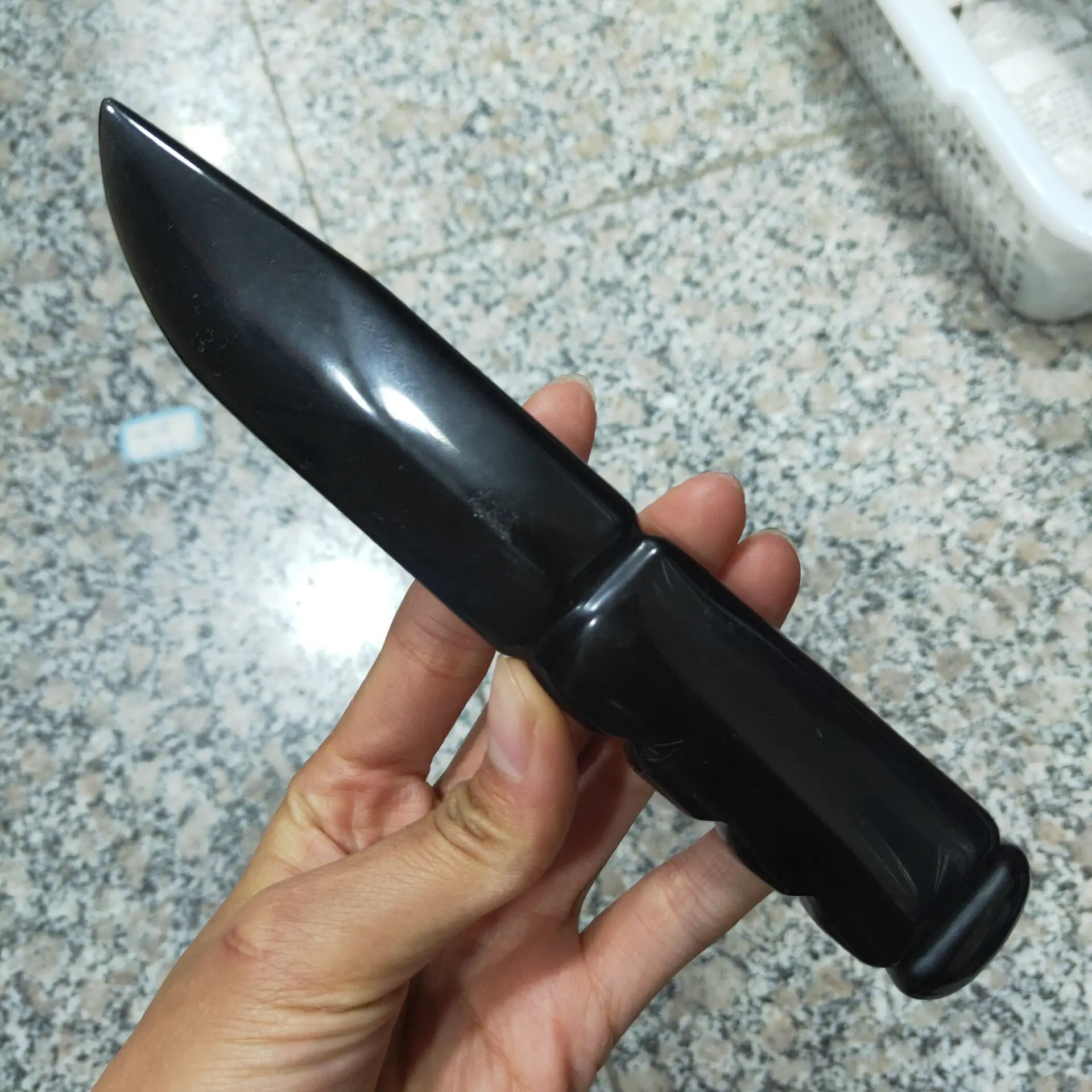 Natural raw stone hand carved energy obsidian knife. Quartz crystal carving polished reiki living room ornament treatment