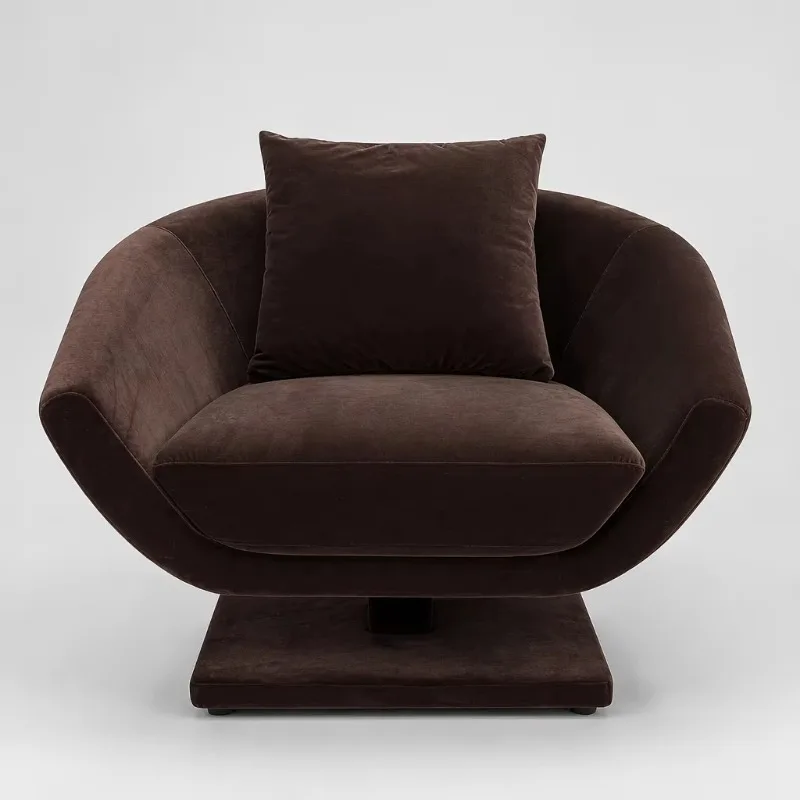Brown velvet lounge chair with sculptural shell seat base and armrests