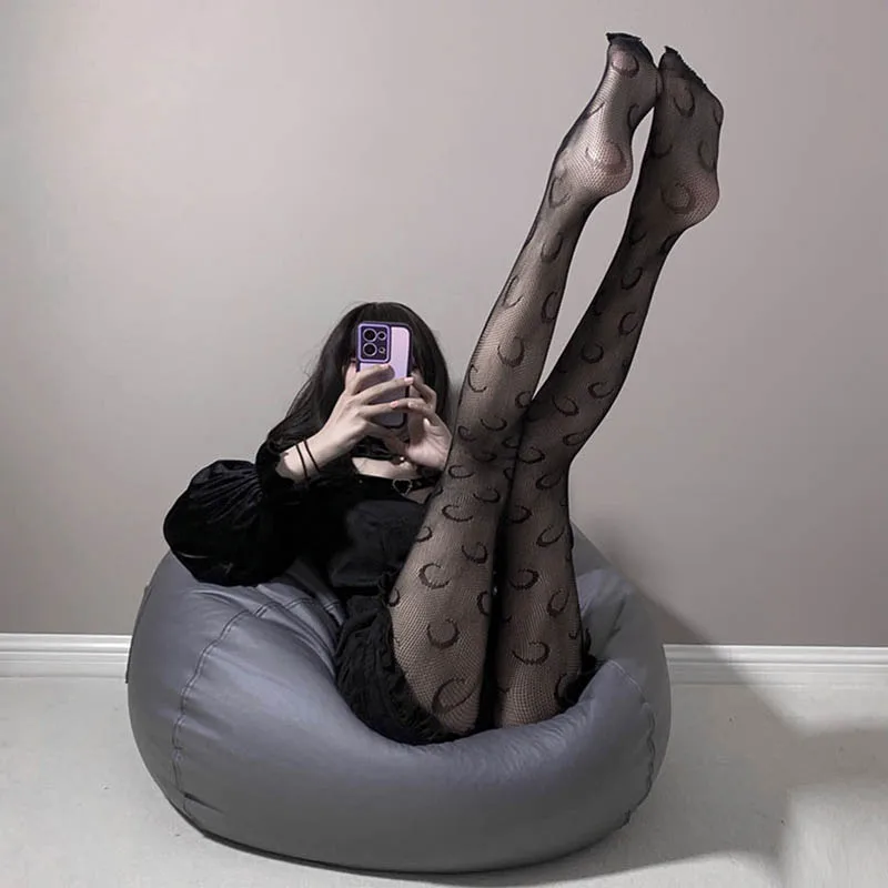 

Sexy Women's Stockings Black Moon Jacquard Fishnet Socks Hollow Transparent Tights Lolita Dark Pantyhose Japanese Sweet Stocking