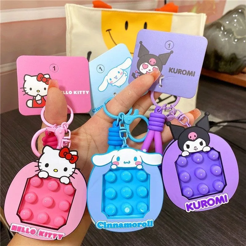 

MINISO SANRIO Hello Kitty Kuromi My Melody Cinnamoroll Pompompurin Pochacco Cartoon Press The Bubble Music Key Chain Key Chain