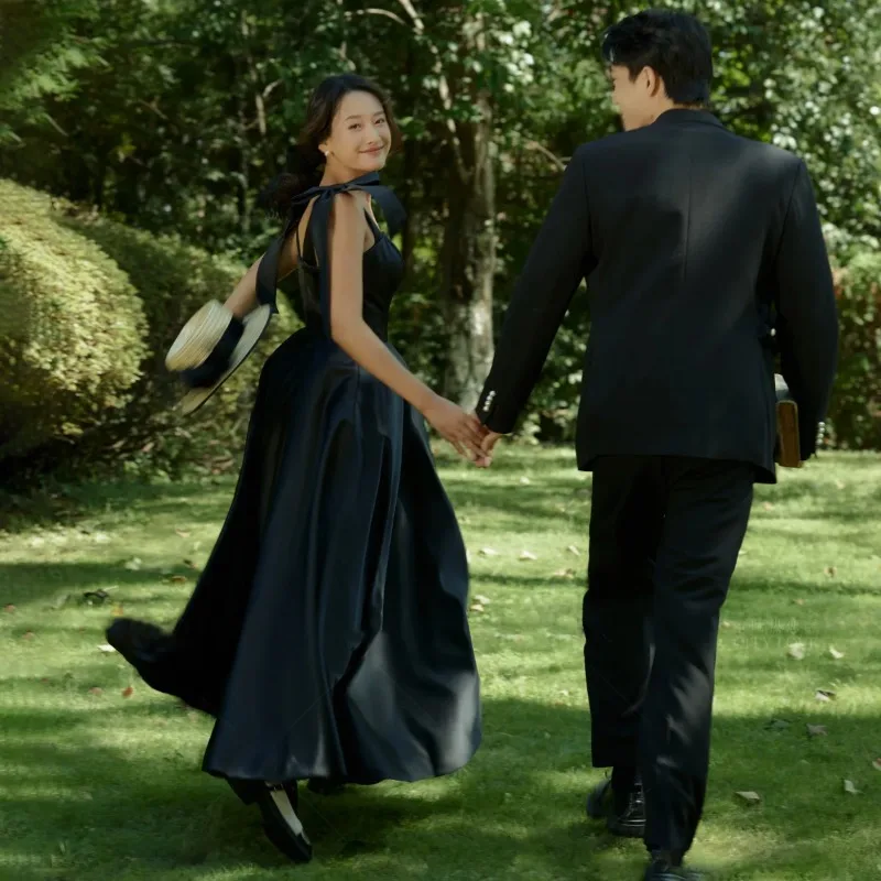 黒のシンプルなウェディングドレス女性のファッションスパゲッティストラップエレガントな A ラインパーティードレスサテンロングイブニングドレス