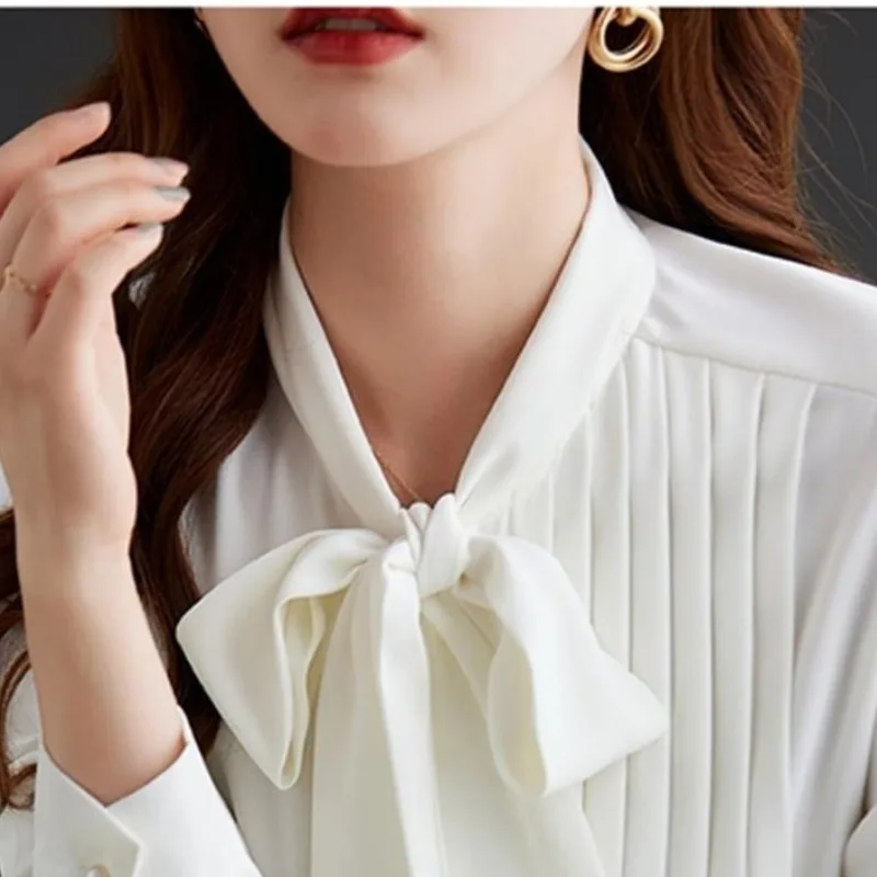 Women's 2024 Summer New Spliced Bow Neck Button Screw Thread Fashion Solid Slim Irregular Casual Long Sleeved Blouses Shirts