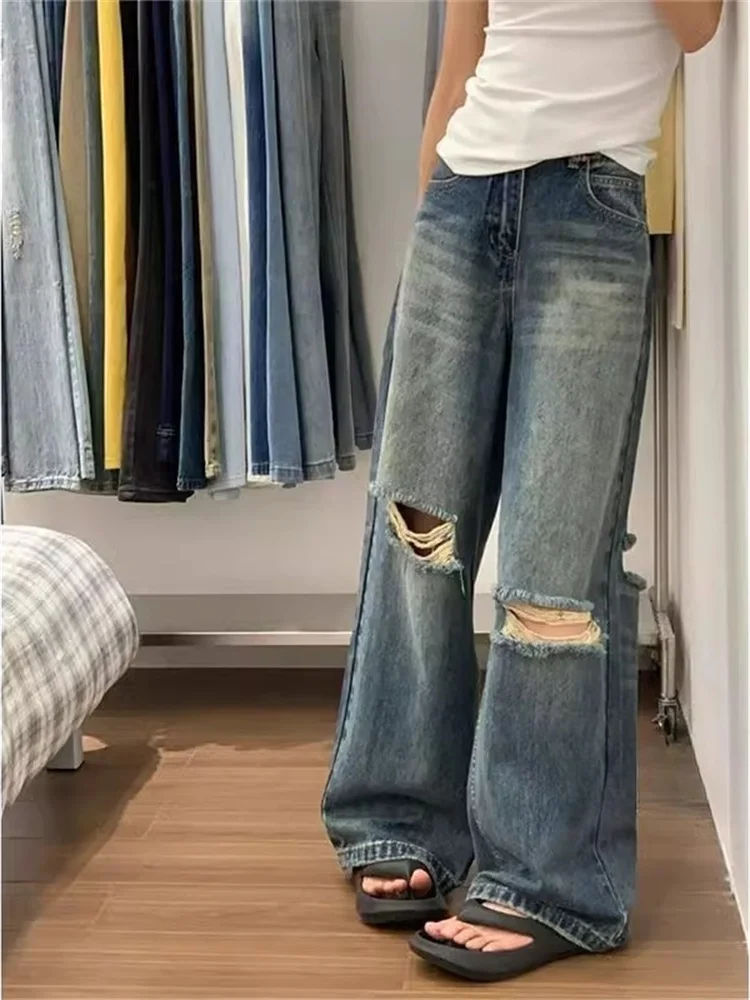 جينز نسائي عالي الخصر وواسع الساق فضفاض مناسب بطول الأرض وتصميم رفيع وإحساس أمريكي عالي الشارع مقاس كبير