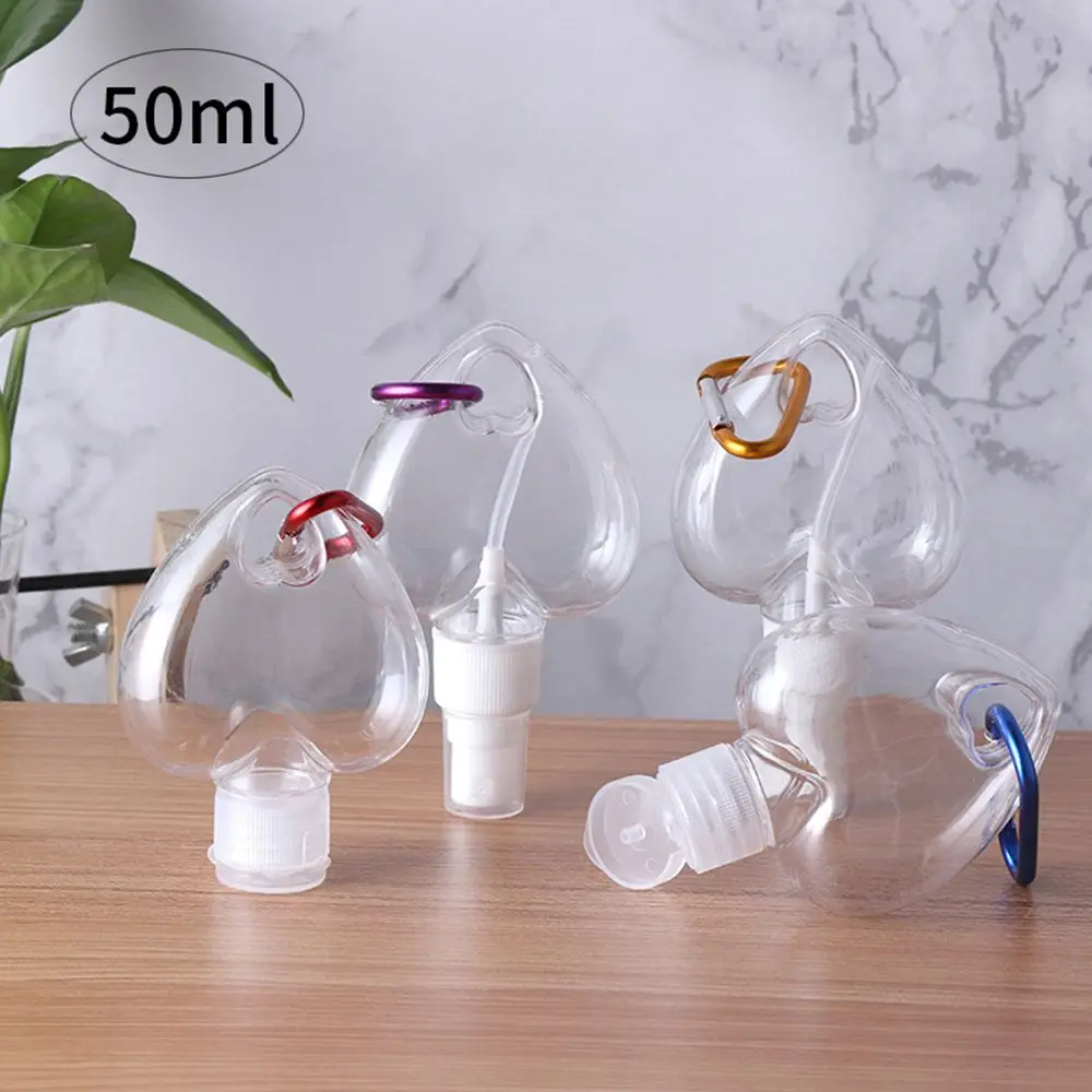 50ml Refillable Transparent Perfume Alcohol Heart Spray Bottle with Metal Hook Lotion Jar Empty Container Bottle