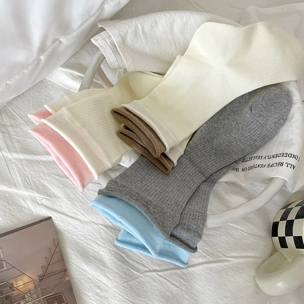 新しい保温ベルベット靴下肥厚ソフトミッドチューブ靴下綿二ネジタイプの女性の靴下冬