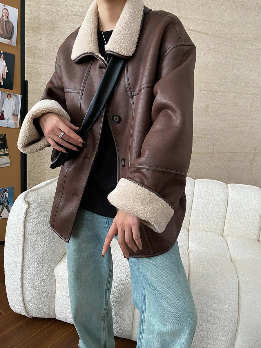 Winter women\'s casual solid color lapel long sleeved loose fur one-piece jacket