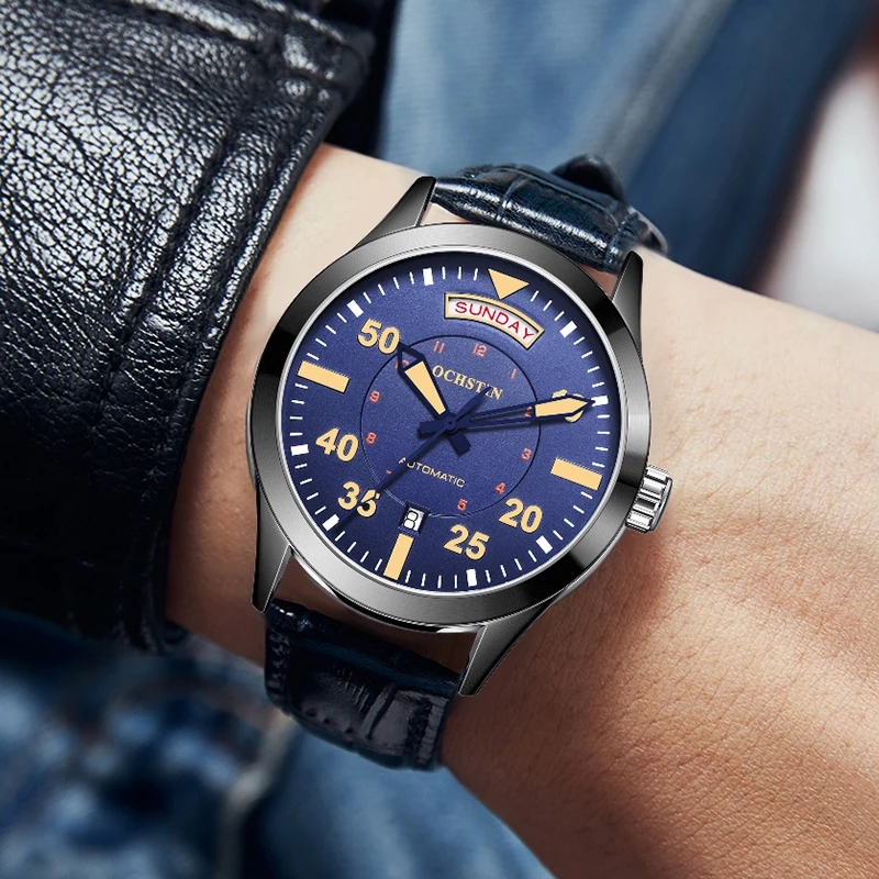 

OCHSTIN Fashion Luxury Mechanical Automatic Skeleton Dual Calendar Watch Transparent Back Cover Minimalist Design With Blue Dial