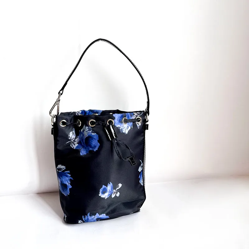 

Vintage Print Style Handmade Small Bucket Bag Printed genuine leather with nylon hand-held small bucket bag