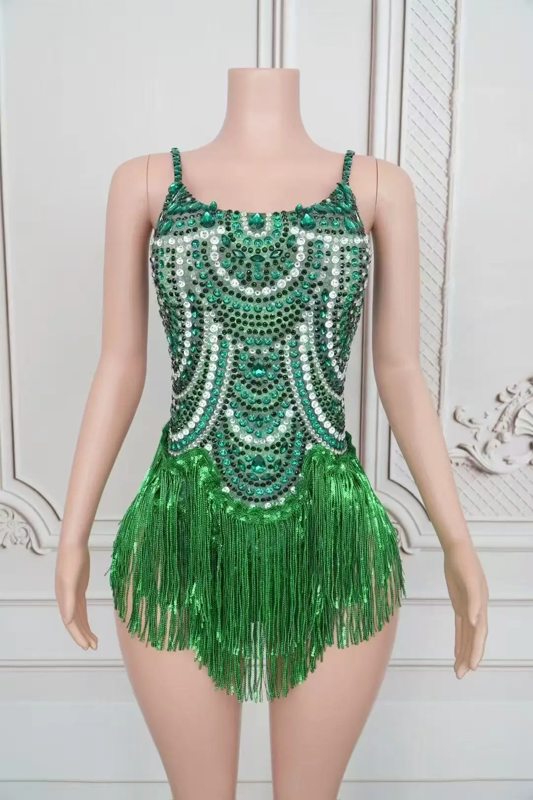 

bright white and wild dance music festival costume The star sings with the same blue tassel