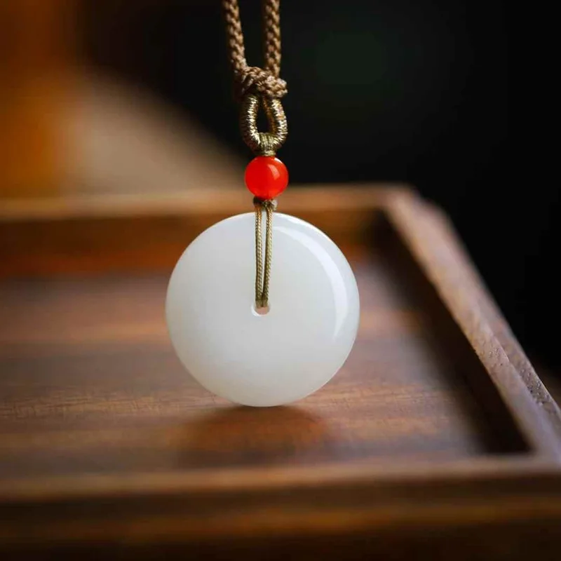 

Natural Hetian Qinghai Old Material White Jade Peace Pendant